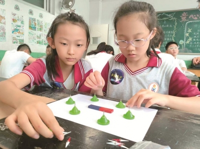 <br>          ■磁铁磁场分布及磁力的影响因素探究项目比赛现场<br><br>        